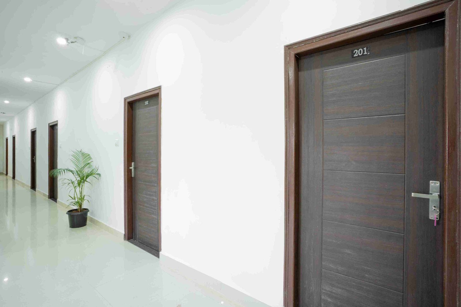Comfortable premium hotel room representing accommodation at SS Hotels Bengaluru